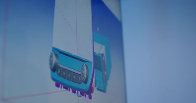Nahaufnahme von einer dreidimensionalen CAD-Modellierung eines technischen Bedienelements auf dem Monitor