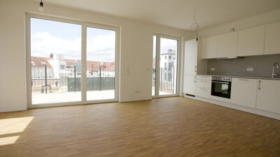 Helle Neubauwohnung mit offener Küche und Holzboden
